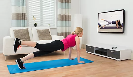 How can you stream live Zoom yoga and pilates classes on a smart TV?