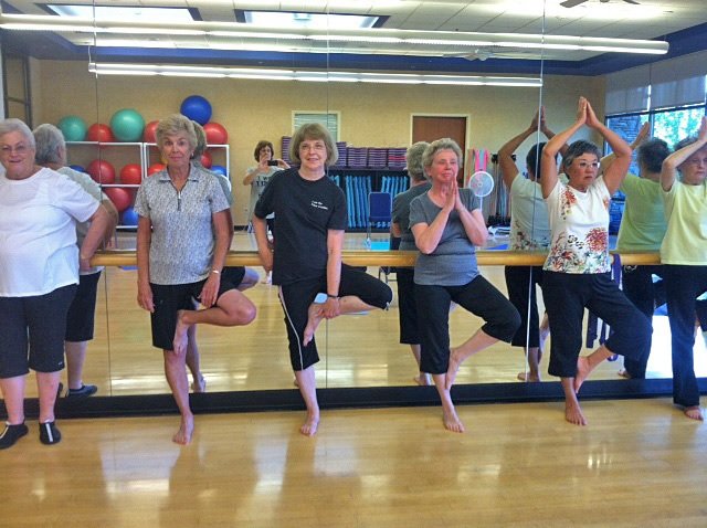 Seniors learning Yoga